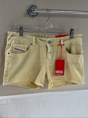 Diesel NEW with Tags Yellow denim Distressed shorts .